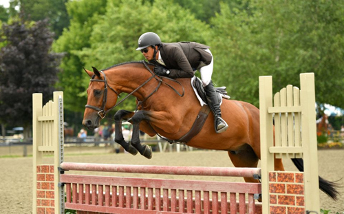 Colin Syquia Claims Victory in $5,000 Hunter Derby at Vermont Summer Festival